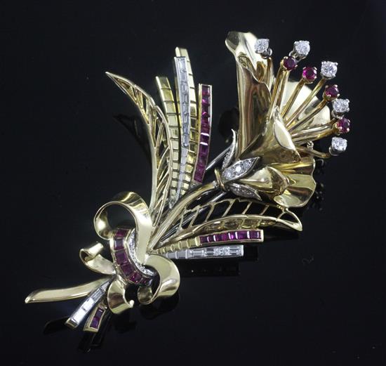 A gold, ruby and diamond set floral spray brooch, gross 37.1 grams.